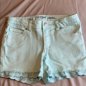 Seafoam green shorts with lace detail at hem (7/8)